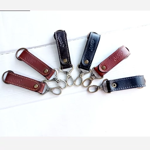 جاسوویچی و جاکلیدی چرم مردانه مناسب کلید سوویچ ماشین جاکلیدی چرم طبیعی فیروزه چرم محلات بسیارشیک وجذاب بارنگ بندی مشکی قهوه ای